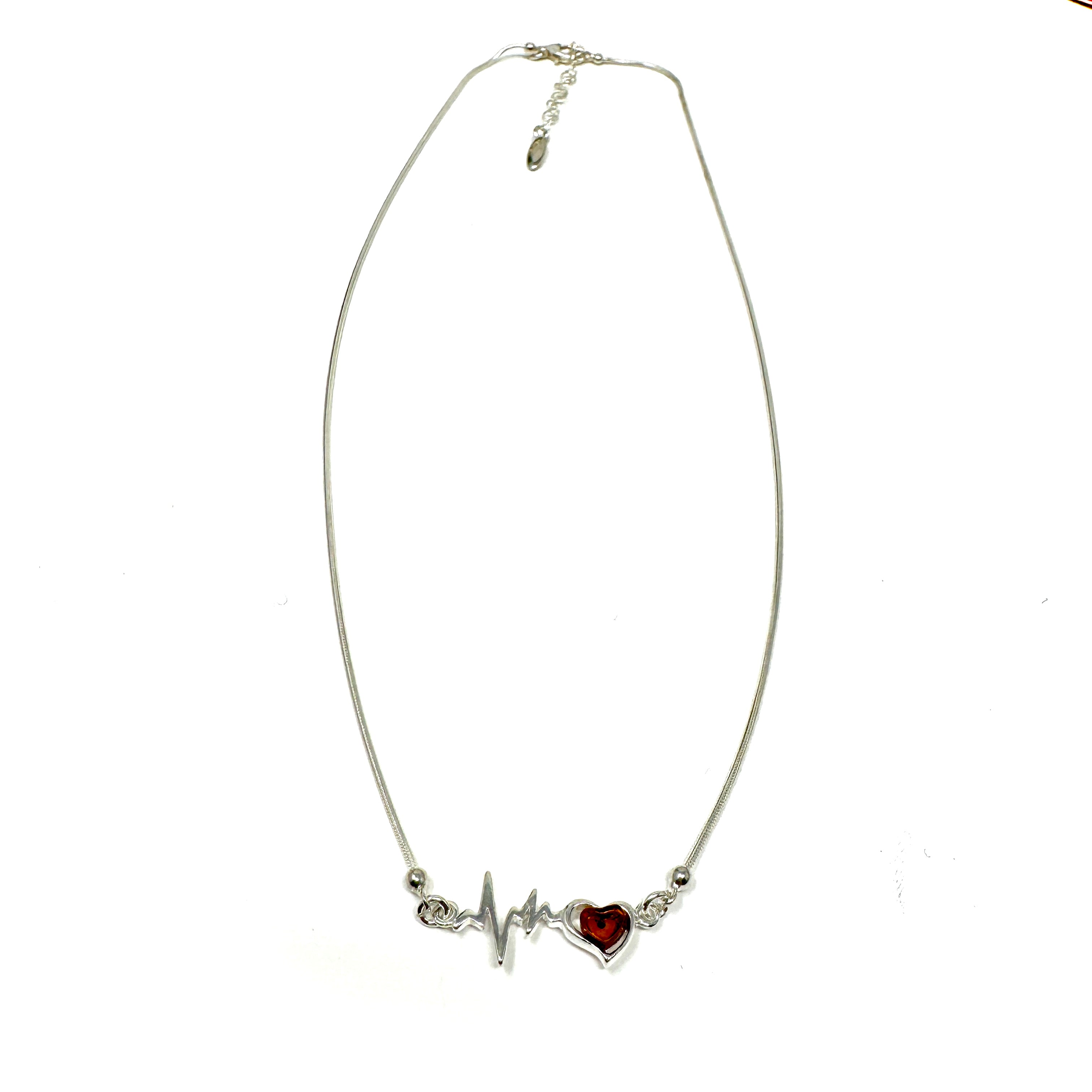 Elegante Bernstein Kette aus 925er Silber mit Herzschlag-Motiv und eingefasstem Bernstein-Herz.